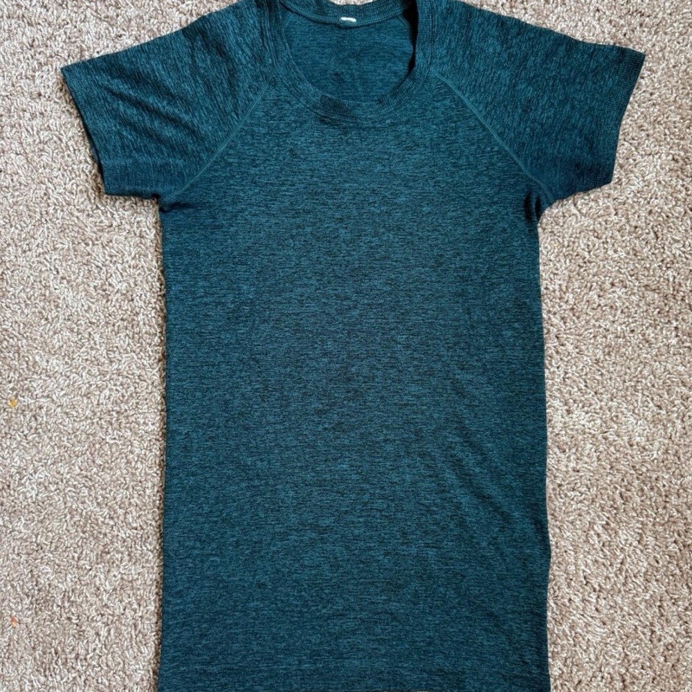 Lululemon heathered teal swiftly, like new! Size 4